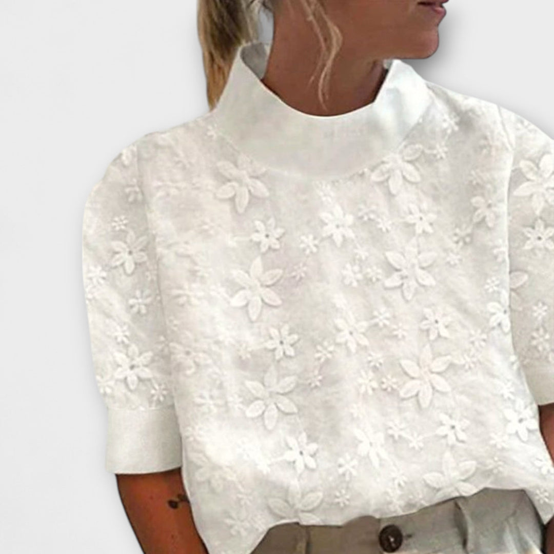 Bluse med broderet ensfarvet krave